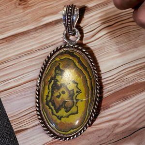 Natural Handmade Peridot Arizona Parrot Green Brownish Pendant.